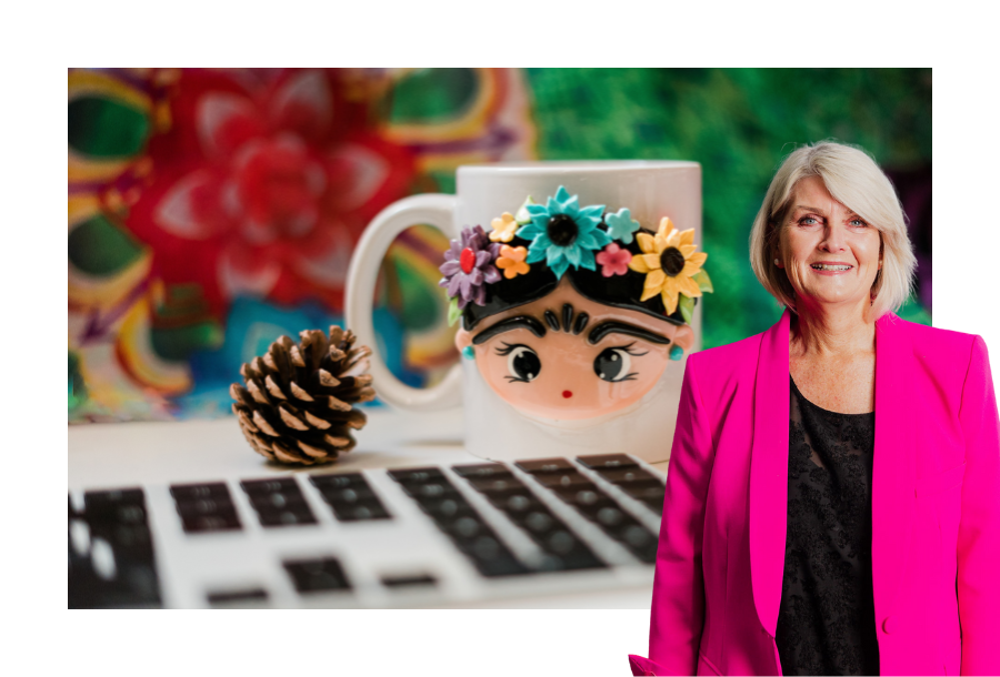 Pictured, Director Amanda Wilkens in a bright pink blazer standing in front of a stock image of a laptop, a set of airpods and a colourful coffee mug