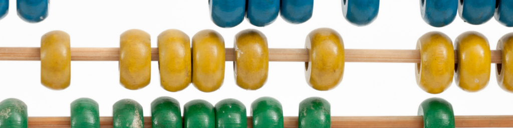 Colourful close up picture of a wooden amicus, colours you can see are. blue, yellow and green