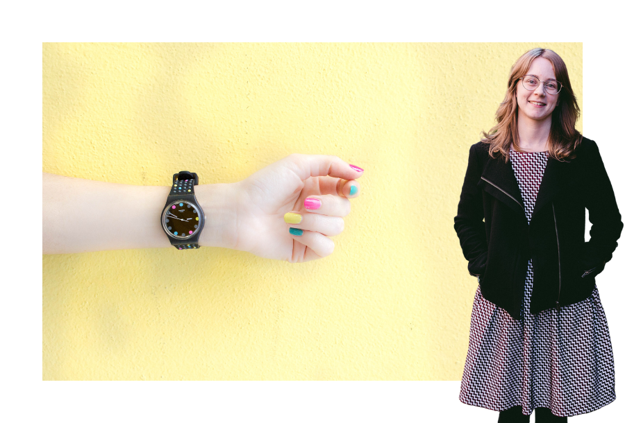 A light yellow background with a hand in the middle of the picture wearing a black watch and neon coloured painted fingernails, with Brittany Bell standing on the right hand side.